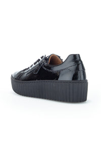Sneakers with a thick sole - black patent leather