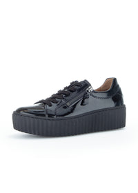 Sneakers with a thick sole - black patent leather