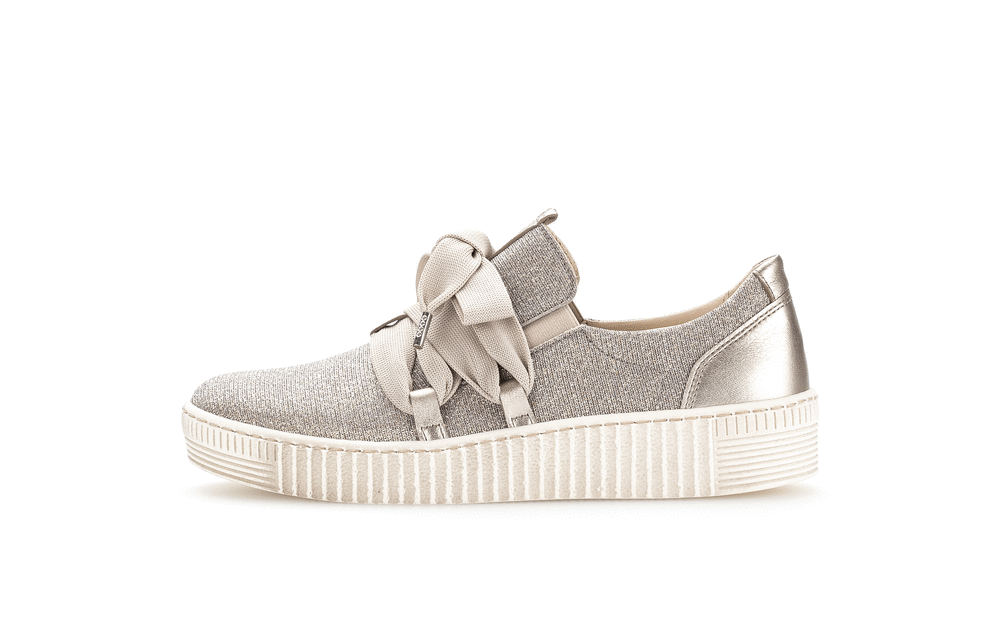 Walking shoes with a thick sole - glittering gold fabric, wide laces