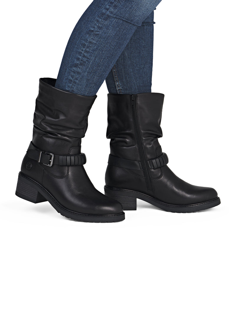 Talvisaapikkaat tolppakorolla - musta nahka, rypytetty varsi, remmikoriste