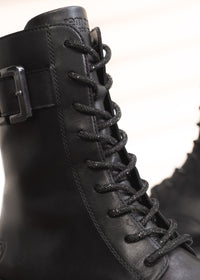 Ankle boots - black leather, buckle decoration on the shaft, sparkling laces