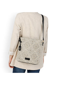 Naisten olkalaukku - vaalea kuvioitu tekstiili