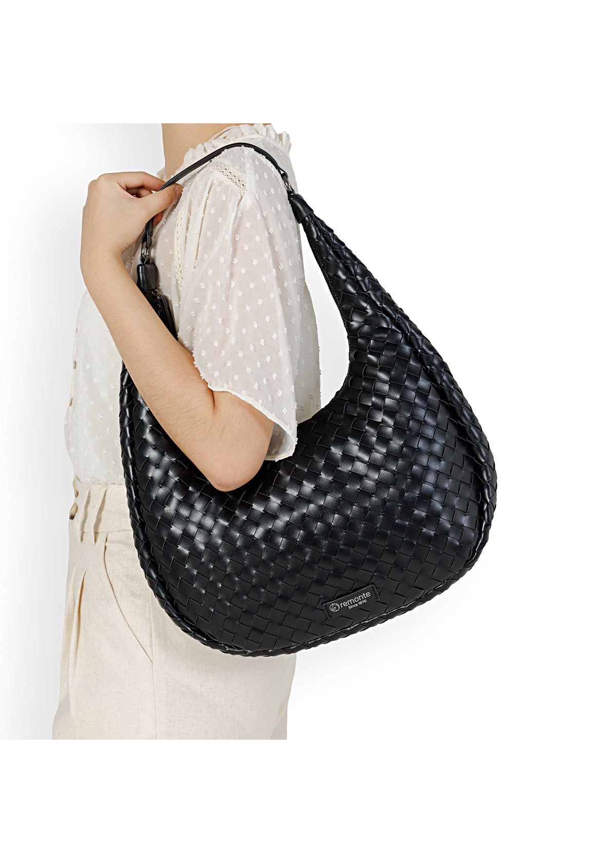 Naisten käsilaukku - musta punos